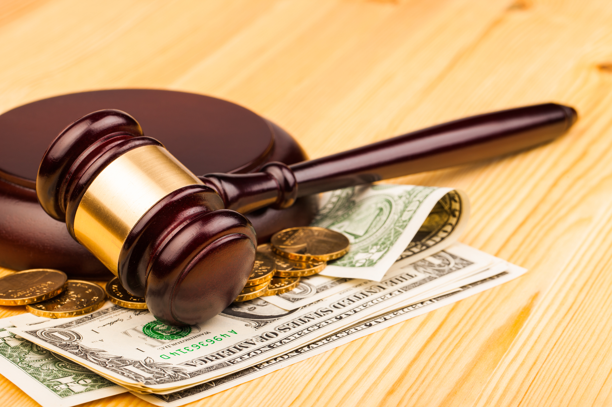 Bankruptcy Vs. Debt Consolidation - gavel and money