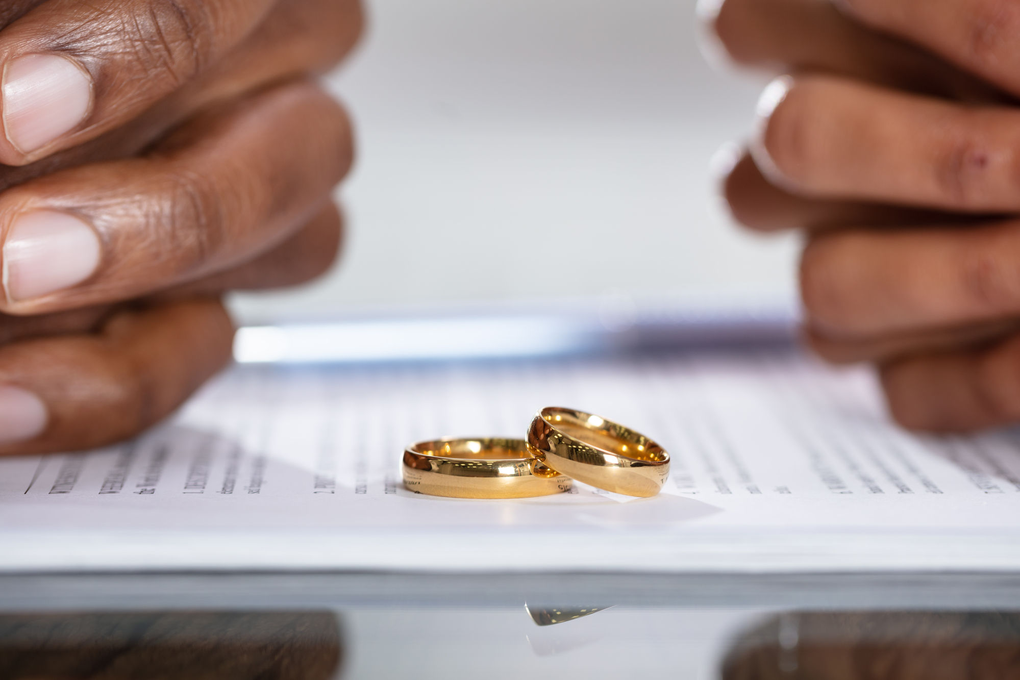 How To Deal With A Difficult Divorce - Couple Hands On Divorce Agreement